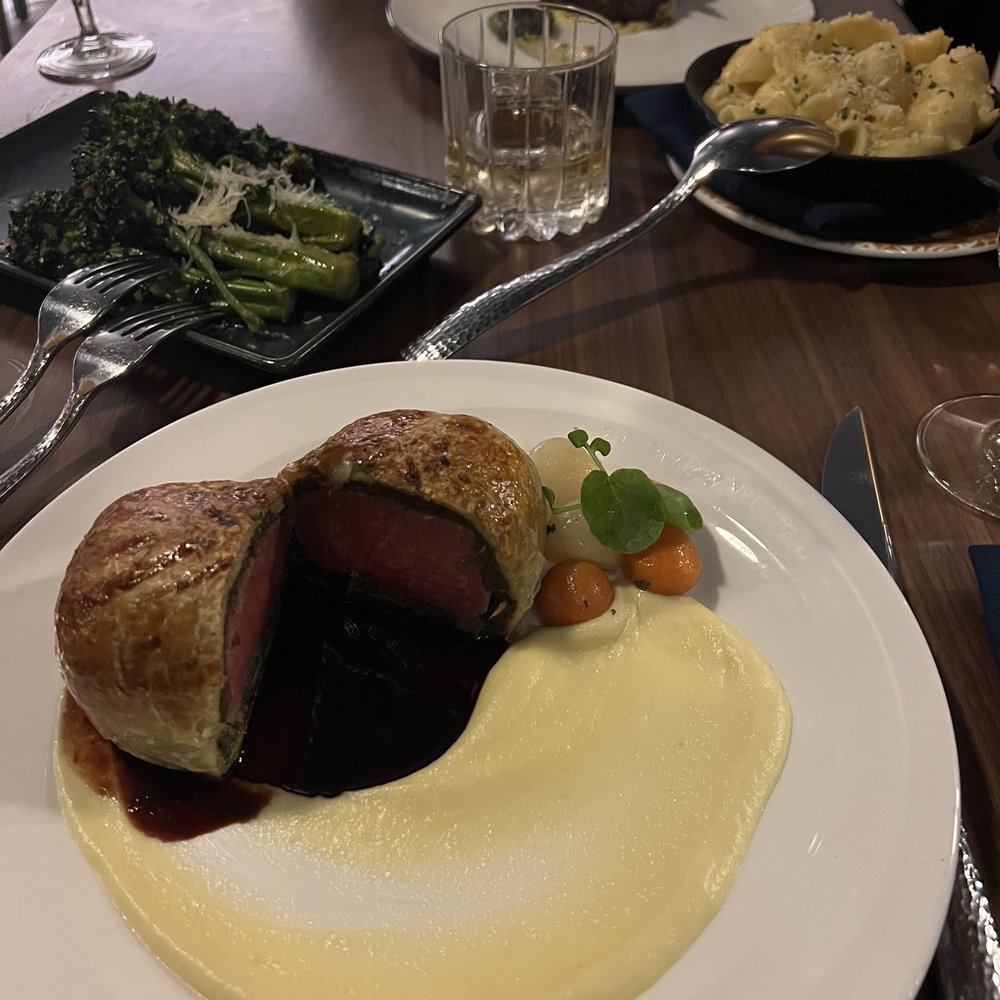 Ramsay's Kitchen - Beef Wellington, broccolini, Mac n cheese, and filet mignon - New American Near Me - Las Vegas, Nevada Ramsay's Kitchen - Beef Wellington, broccolini, Mac n cheese, and filet mignon - New American Near Me - Las Vegas, Nevada