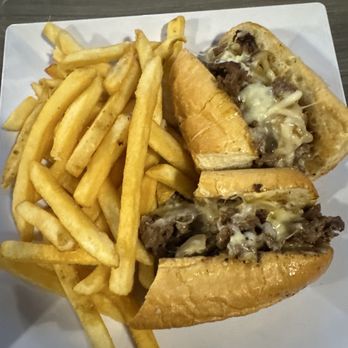 Eddie's Bar & Grill - Cheesesteak and fries - Sports Bars Near Me - Largo, Florida Eddie's Bar & Grill - Cheesesteak and fries - Sports Bars Near Me - Largo, Florida