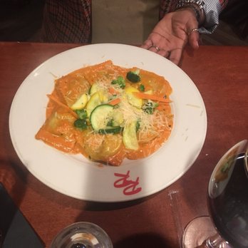 Red Rocks Cafe - Shrimp and grits ravioli (the grits are inside the ravioli) - Bars Near Me - Charlotte, North Carolina Red Rocks Cafe - Shrimp and grits ravioli (the grits are inside the ravioli) - Bars Near Me - Charlotte, North Carolina