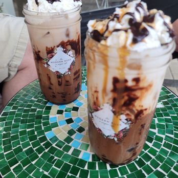 The Modern Rose - Iced mocha and an iced caramel mocha with almond milk. - Coffee & Tea Near Me - Deerfield Beach, Florida The Modern Rose - Iced mocha and an iced caramel mocha with almond milk. - Coffee & Tea Near Me - Deerfield Beach, Florida