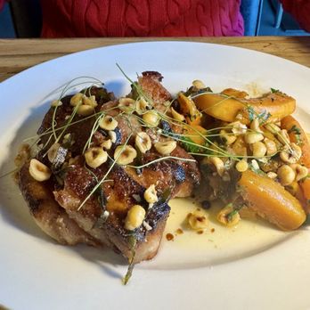 Conifer - Pork chops with butternut squash and hazelnuts. - New American Near Me - Bentonville, Arkansas Conifer - Pork chops with butternut squash and hazelnuts. - New American Near Me - Bentonville, Arkansas