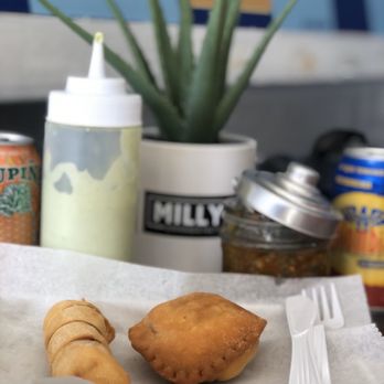 Milly's Empanada Factory - Guava and cheese tequeño and a cheese pastelito. - Venezuelan Near Me - Miami, Florida Milly's Empanada Factory - Guava and cheese tequeño and a cheese pastelito. - Venezuelan Near Me - Miami, Florida