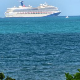 Watching the cruise ships go by from my balcony