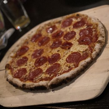Bluebird Cafe & Grill - Fire cooked meat lovers pizza - Italian Near Me - Orangeville, Ontario