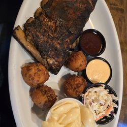 Drifters - Excellent half a rack of St. Louis ribs with Mac n cheese, four hush puppies and Cole slaw.