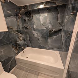 Daidone Tile - Cut well around the fixtures and the soffit.
