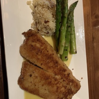 Tommy Bahama - Snapper with pistachio on a bed of coconut rice is very good. Ask for lemon to sprinkle on the fillet. - Seafood Near Me - Naples, Florida Tommy Bahama - Snapper with pistachio on a bed of coconut rice is very good. Ask for lemon to sprinkle on the fillet. - Seafood Near Me - Naples, Florida
