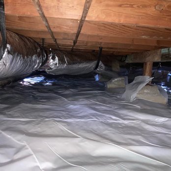 Attic Cleaning Services - After: New ducts and vapor barrier - Insulation Installation Near Me