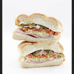 Delicious Traditional Mexican Sandwiches prepared with your choice of Carnitas(Pulled Pork), Jamon (Ham)con Queso Fresco,or Hawaiian Style!
