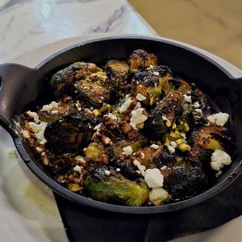 Pizza Art Wine - BRUSSELS SPROUTS Oven roasted brussel, orange blossom honey glaze pistachio & goat chease - Italian Near Me - Baton Rouge, Louisiana Pizza Art Wine - BRUSSELS SPROUTS Oven roasted brussel, orange blossom honey glaze pistachio & goat chease - Italian Near Me - Baton Rouge, Louisiana