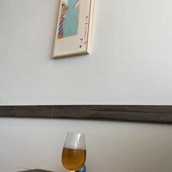 Sushi Zen - a glass of beer on a table - Japanese Near Me - Jacksonville, Florida Sushi Zen - a glass of beer on a table - Japanese Near Me - Jacksonville, Florida