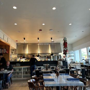 Tisza Bistro - Interior dining room with view of kitchen - Modern European Near Me - Healdsburg, California Tisza Bistro - Interior dining room with view of kitchen - Modern European Near Me - Healdsburg, California