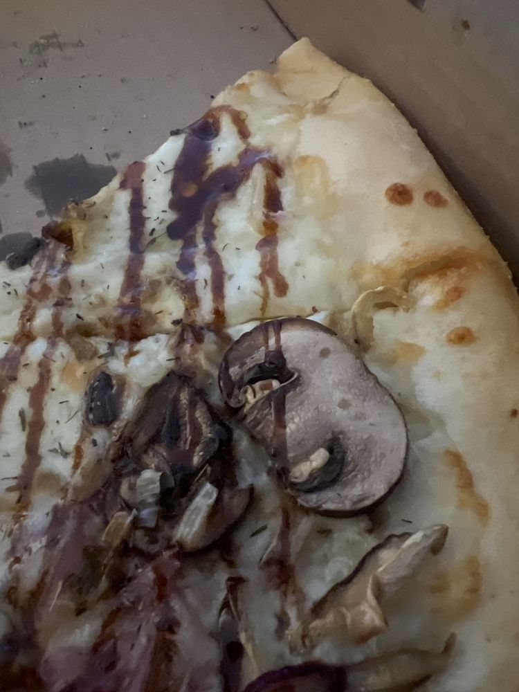 The Pizza Slice Logo