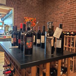 Bluestone Jewelry & Wine - Inside the wine mine which is located in the 2nd room after passing by all of the lovely works of art on the wall & within the jewelry cases