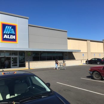 ALDI - The façade looks like an architectural time-line of ALDI store design from the present to the past going left to right. - Grocery Near Me - Rialto, California ALDI - The façade looks like an architectural time-line of ALDI store design from the present to the past going left to right. - Grocery Near Me - Rialto, California