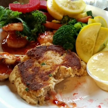 The Wharf - Crab cake with mustard sauce and Thai grilled shrimp side of mixed veggies. - Seafood Near Me - St Pete Beach, Florida