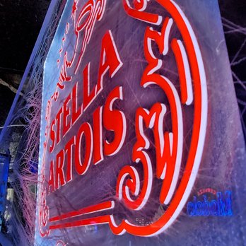 Ewell's Place - a neon sign for a restaurant - Dive Bars Near Me - Fresno, California