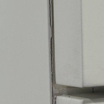 Rainier Woodworking Company - More excess paint that is now cracking and peeling off. - Cabinetry Near Me - Tacoma, Washington