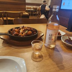 Maru - Baby  octopus sizzling  all the way as the pan hit the table! And a lovely Korean Lychee alcoholic drink.