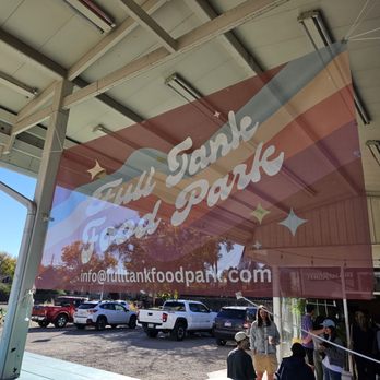Full Tank Food Park - Sign near picnic tables - Coffee & Tea Near Me - Denver, Colorado