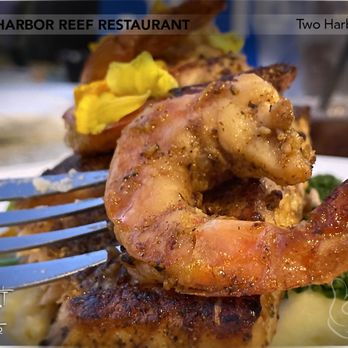 Harbor Reef Restaurant - Mojito Lime Salmon & Shrimp - Beautifully plated; salmon a bit  overcooked; too much salt on shrimp; the mojito lime seasoning was nice. - American Near Me - Two Harbors, California