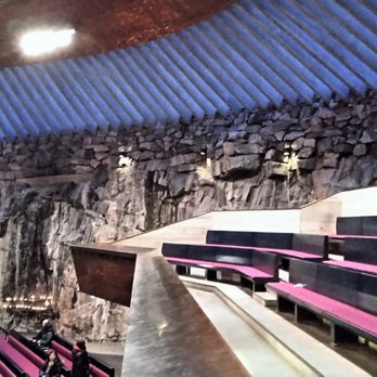 Temppeliaukion kirkko - This is a photo once on the balcony/upper level looking at the angled seating, the rock walls, and the canted windows all around. - Landmarks & Historical Buildings Near Me - Helsinki, 18
