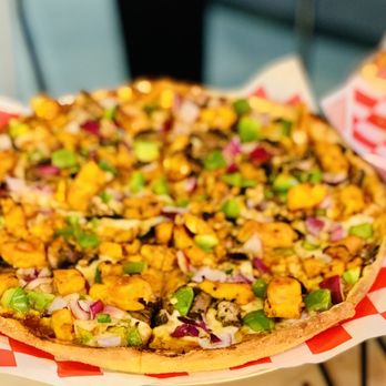 Pizza Twist - a pizza on a paper plate - Pizza Near Me - Herndon, Virginia Pizza Twist - a pizza on a paper plate - Pizza Near Me - Herndon, Virginia