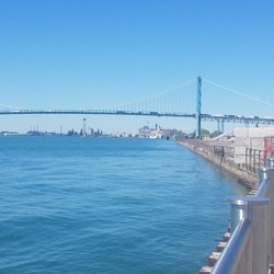Detroit Riverfront Conservancy - Ambassador bridge and the great lakes cruise ship.