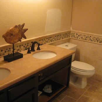 Mastery Tile & Stone - a bathroom with two sinks and a toilet - Flooring Near Me - Santa Paula, California Mastery Tile & Stone - a bathroom with two sinks and a toilet - Flooring Near Me - Santa Paula, California
