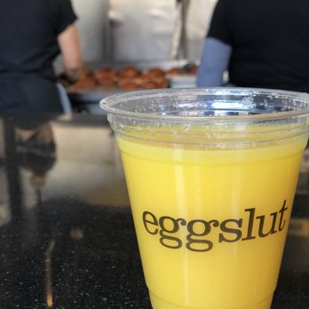 Eggslut - Enjoying my fresh OJ while they prepare my Fairfax with bacon. - Breakfast & Brunch Near Me - Los Angeles, California Eggslut - Enjoying my fresh OJ while they prepare my Fairfax with bacon. - Breakfast & Brunch Near Me - Los Angeles, California