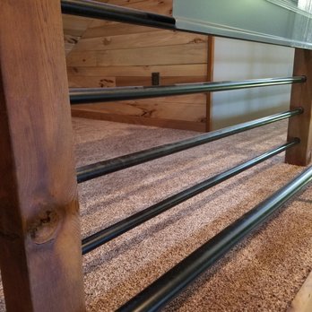 WeLay Flooring - a close up of a bed frame - Flooring Near Me WeLay Flooring - a close up of a bed frame - Flooring Near Me