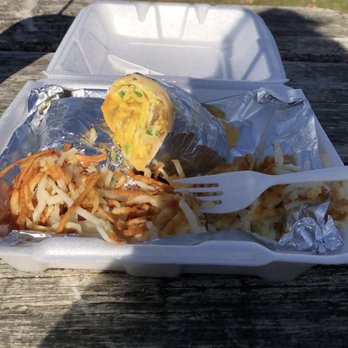 Alpha Koney Island - Breakfast sandwich, added green pepper and onion. The other half of the wrap is in there, came with a side of hash browns too! - Diners Near Me - Adrian, Michigan