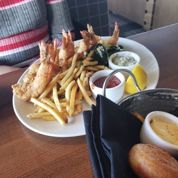 Stoney River - Shrimp, fries and spinach... rolls in the foreground - Steakhouses Near Me - Troy, Michigan Stoney River - Shrimp, fries and spinach... rolls in the foreground - Steakhouses Near Me - Troy, Michigan