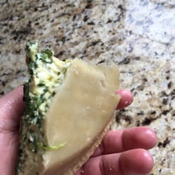 Fresh Thyme Market - Spinach gets quiche after reheating in oven at 350° for 20 min. Raw and soggy crust. Gross.
