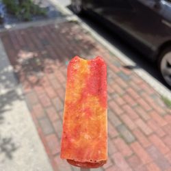 Passion fruit ice pop (with a small bite taken out of it)