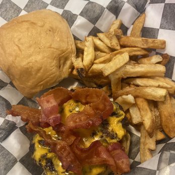 FUDDRUCKERS - a burger and fries on a checkered tray - Burgers Near Me - Robinsonville, Mississippi FUDDRUCKERS - a burger and fries on a checkered tray - Burgers Near Me - Robinsonville, Mississippi