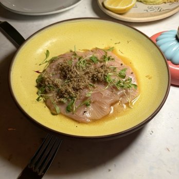 Bar Issi - hamachi carpaccio: summer truffle, yuzu + ponzu sauce = $29 - Italian Near Me - Palm Springs, California Bar Issi - hamachi carpaccio: summer truffle, yuzu + ponzu sauce = $29 - Italian Near Me - Palm Springs, California