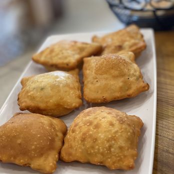 Pattternz - a plate of pastries on a table - Mediterranean Near Me - Sterling Heights, Michigan