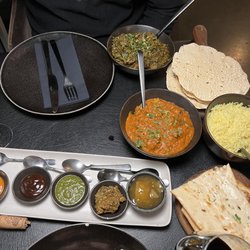 Restaurant Rasoi - Chicken Tikka, Lamb Saag, garlic naan, pappadum plus pickle/chutney selection.