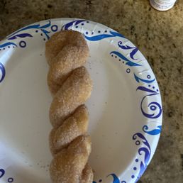 a donut on a paper plate