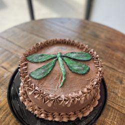 KM Creations Bakery - This dragon fly cake was a year memorial for a couple of parents that vacationed here with there Daughter. Her celebration of life/memories