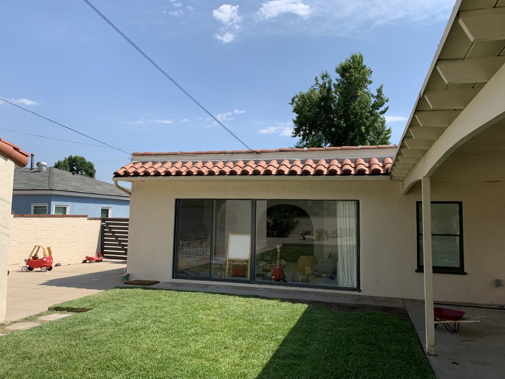 Slide of NRG Roofing