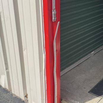 CubeSmart Self Storage - Another picture of the door leading to my storage unit that is completely destroyed and has been for the last month - Self Storage Near Me - Loves Park, Illinois