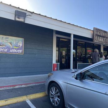 Kawaihae Marketplace - a car parked in front of the store - Seafood Markets Near Me - Waimea, Hawaii Kawaihae Marketplace - a car parked in front of the store - Seafood Markets Near Me - Waimea, Hawaii