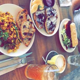 Tofu scramble, blueberry pancakes, breakfast sandwich