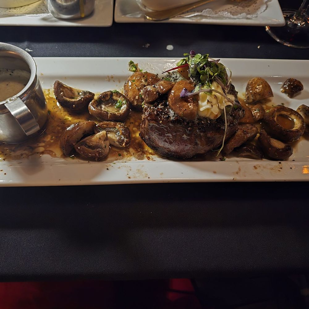 Huffmans Prime Steakhouse - Fliet with Peppercorn Crust and Sautéed Mushrooms - Steakhouses Near Me - Parkersburg, West Virginia