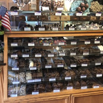 Rocky Mountain Chocolate Factory - a display of chocolates - Chocolatiers & Shops Near Me - Estes Park, Colorado
