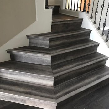 Custom Quality Installations - a staircase in a home - General Contractors Near Me