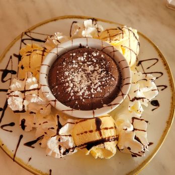 Grand Cafe - a chocolate dessert with bananas and chocolate sauce - Kosher Near Me - Hollywood, Florida