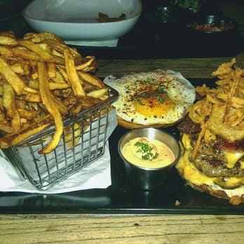Little Bad Wolf - The Wolf burger! "3 patties, cheese, bacon, fried egg, onions straws, pickle, mayo, side of fries,,,,,,,,DA BOMB!!! - American Near Me - Chicago, Illinois Little Bad Wolf - The Wolf burger! "3 patties, cheese, bacon, fried egg, onions straws, pickle, mayo, side of fries,,,,,,,,DA BOMB!!! - American Near Me - Chicago, Illinois